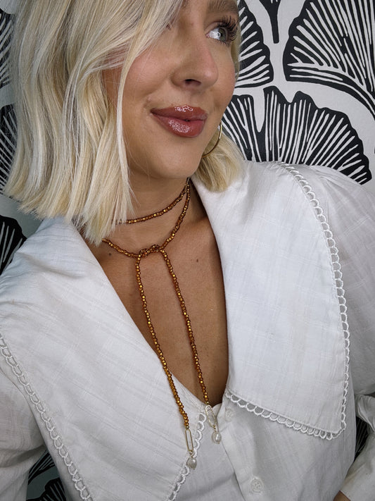 Twist Her Necklace
